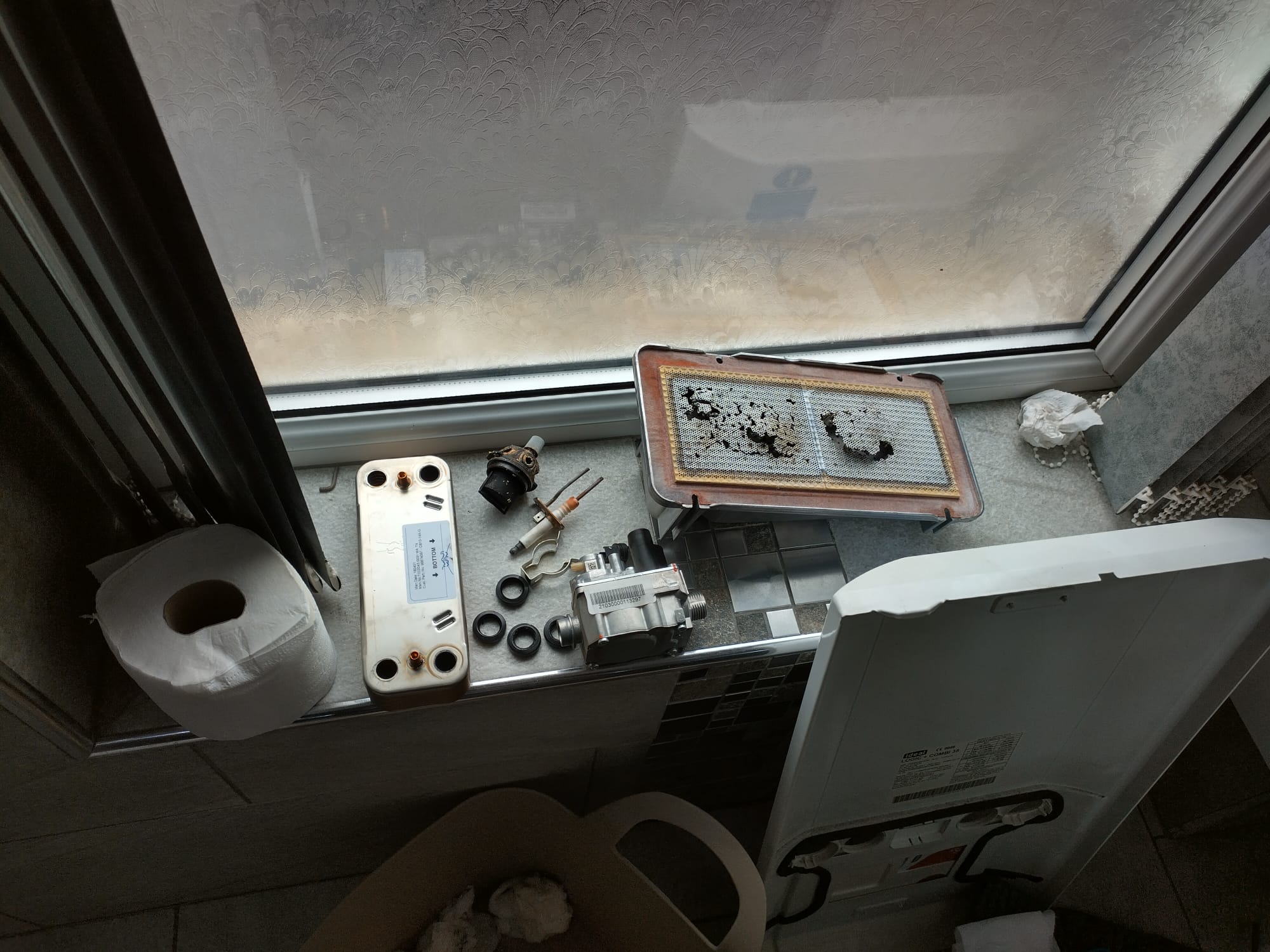 Boiler service strip-down in Bradford — heat exchanger, gas valve, electrode and seals all removed and checked during annual service